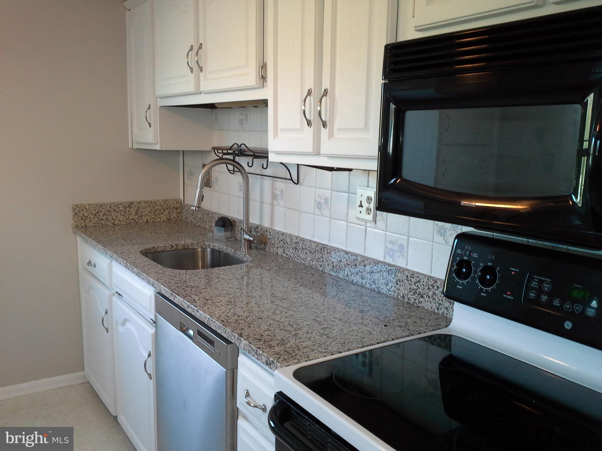 9315 Beowulf Circle Baltimore, MD 21237 - Photo 8 of 28 Beautiful New Granite Counters & updated cabinets