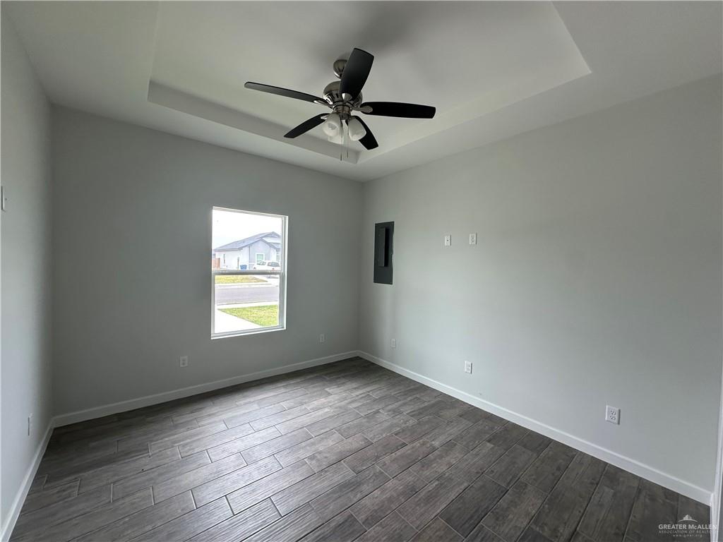 1606 Unity Drive Mercedes, TX 78570 - Photo 6 of 11 a view of an empty room with a window