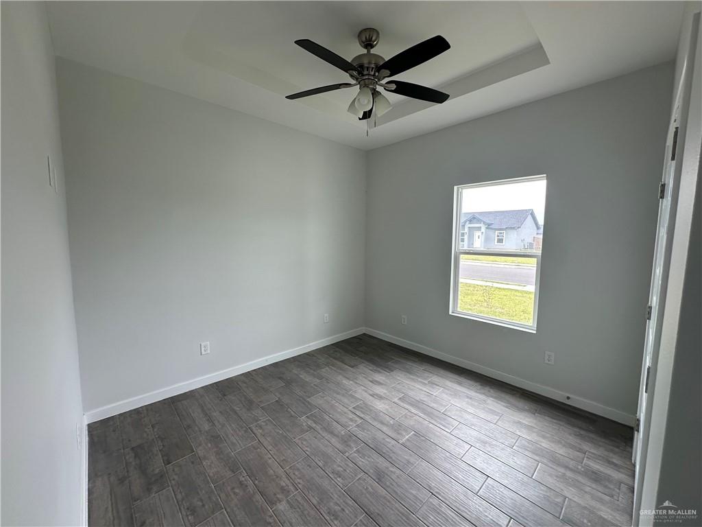 1606 Unity Drive Mercedes, TX 78570 - Photo 8 of 11 a view of an empty room with a window