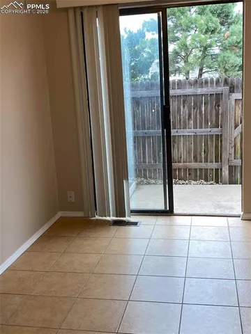 a view of a door and chair