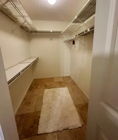 view of a room with racks on the wall