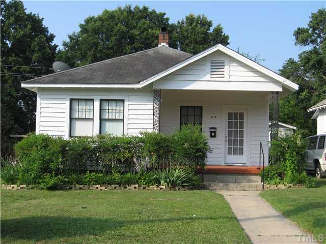 3119 Stanhope Avenue Raleigh, NC 27607 - Photo 1 of 18 a front view of a house with a yard
