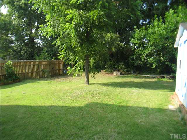 3119 Stanhope Avenue Raleigh, NC 27607 - Photo 18 of 18 a view of a backyard with a trees