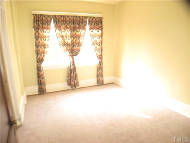 3119 Stanhope Avenue Raleigh, NC 27607 - Photo 6 of 18 a view of a room with large windows
