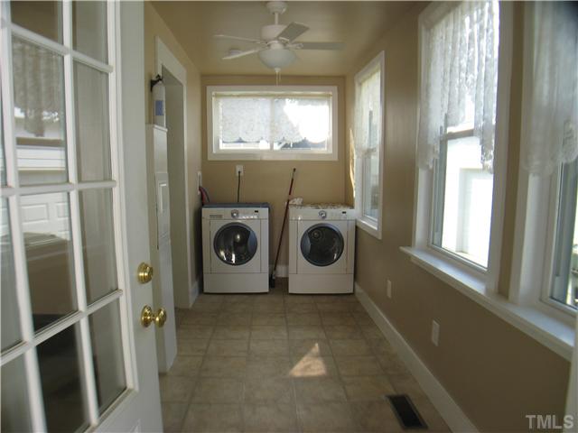3119 Stanhope Avenue Raleigh, NC 27607 - Photo 9 of 18 a view of a storage & utility room with a window
