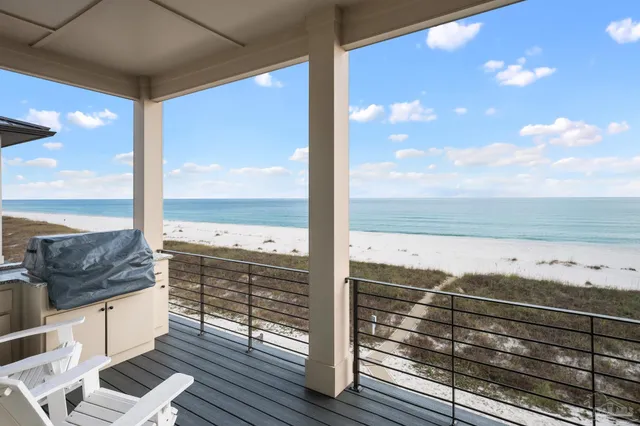 a view of a house with sitting area and furniture