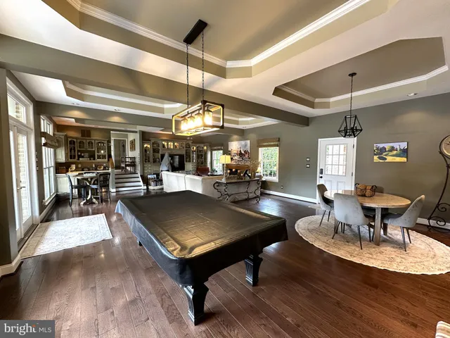 a kitchen with a sink a cabinets and window