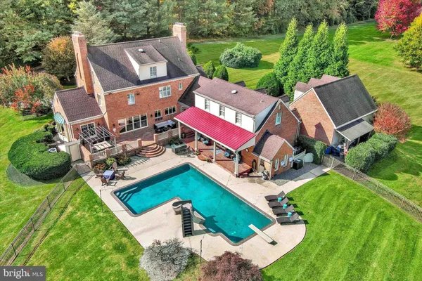 a kitchen with stove and cabinets