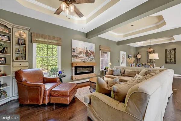 a view of a house with sitting area and garden