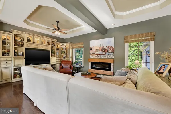 an aerial view of a house with garden space and lake view