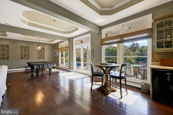 a view of a patio with couches chairs dining table and chairs