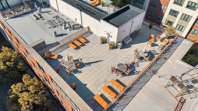 a view of a terrace with chairs