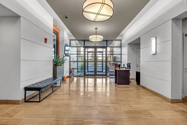 a view of a room with window and wooden floor