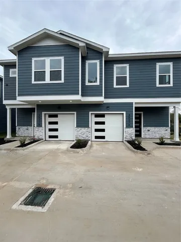 a front view of a house with street