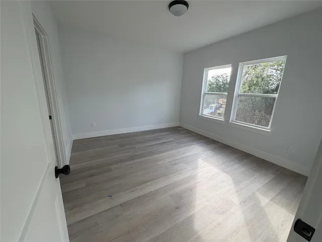 a bathroom with a toilet a sink and a bathtub