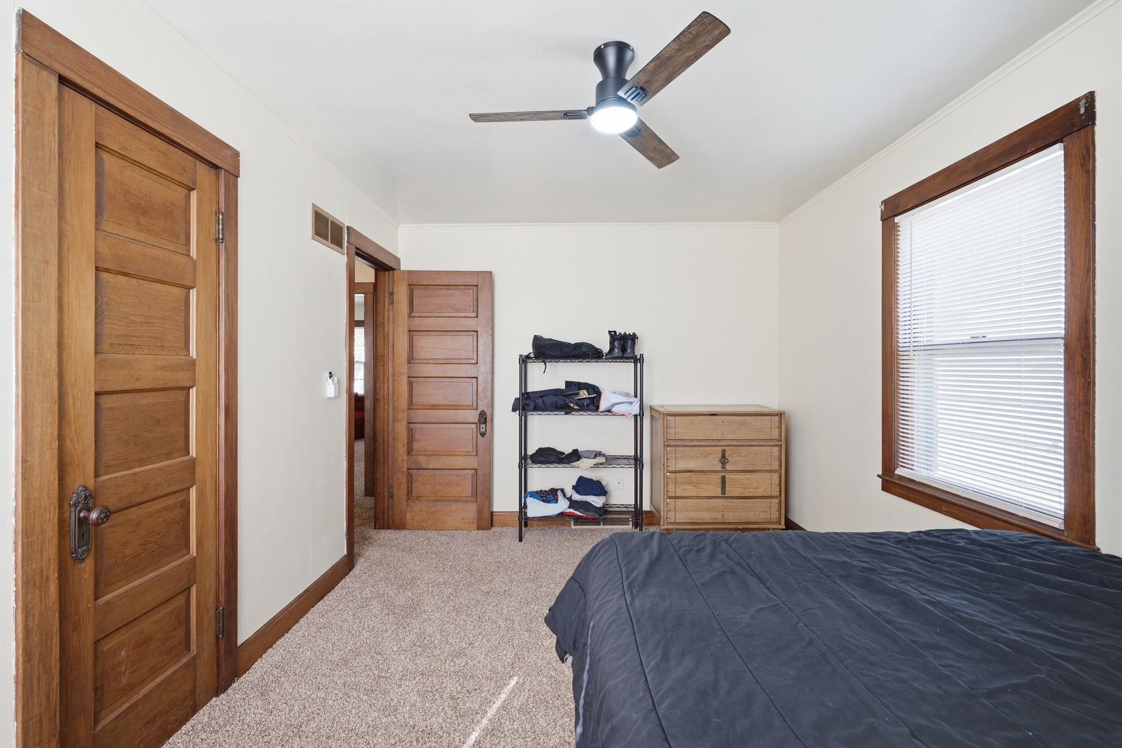 1908 24th Street Moline, IL 61265 - Photo 18 of 32 a bedroom with a bed and a walk in closet