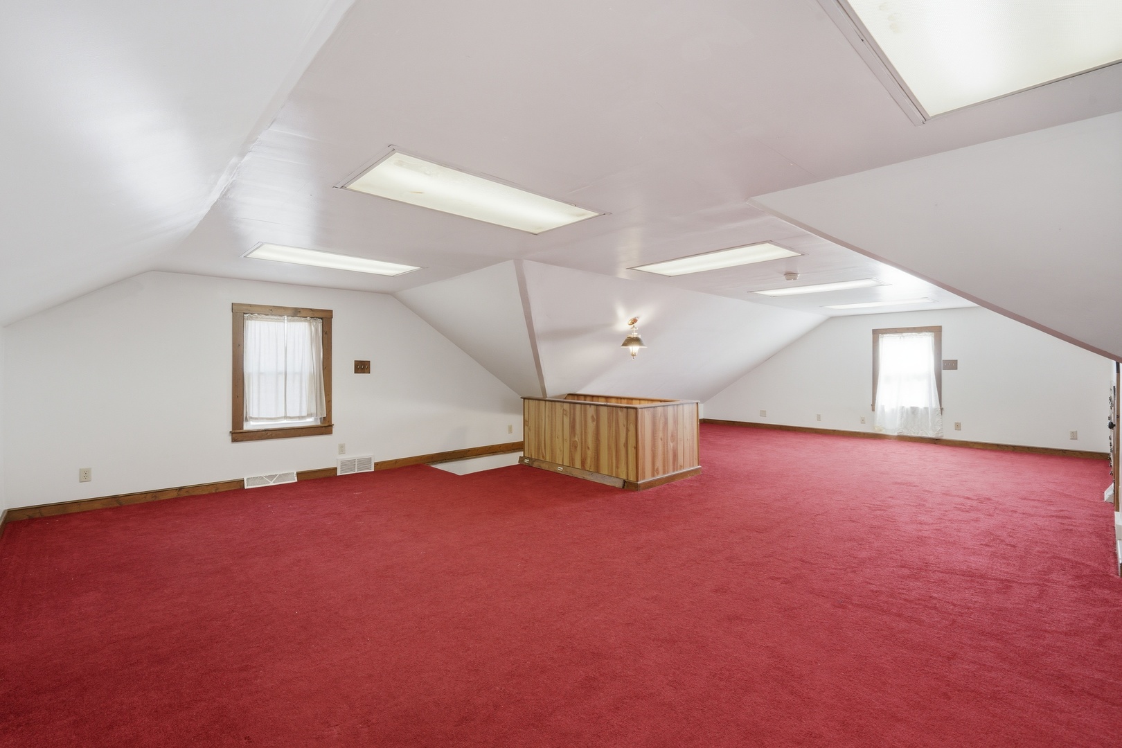 1908 24th Street Moline, IL 61265 - Photo 20 of 32 an empty room with chandelier fan and windows