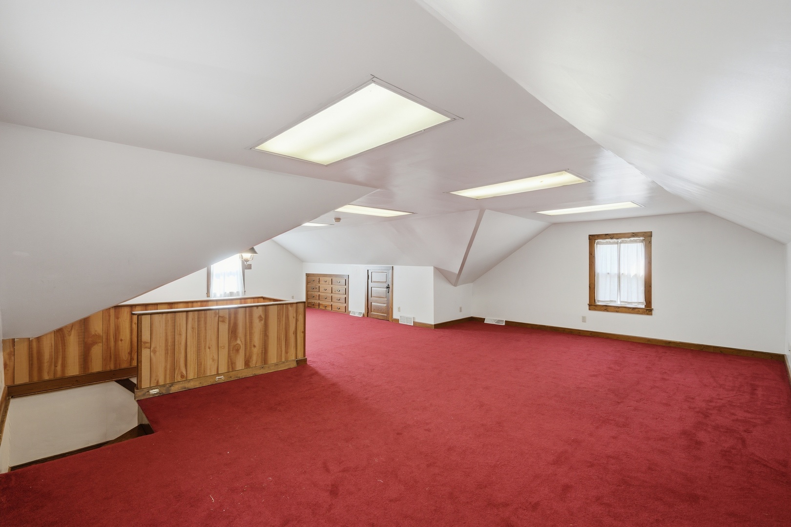 1908 24th Street Moline, IL 61265 - Photo 21 of 32 a view of an empty room with windows