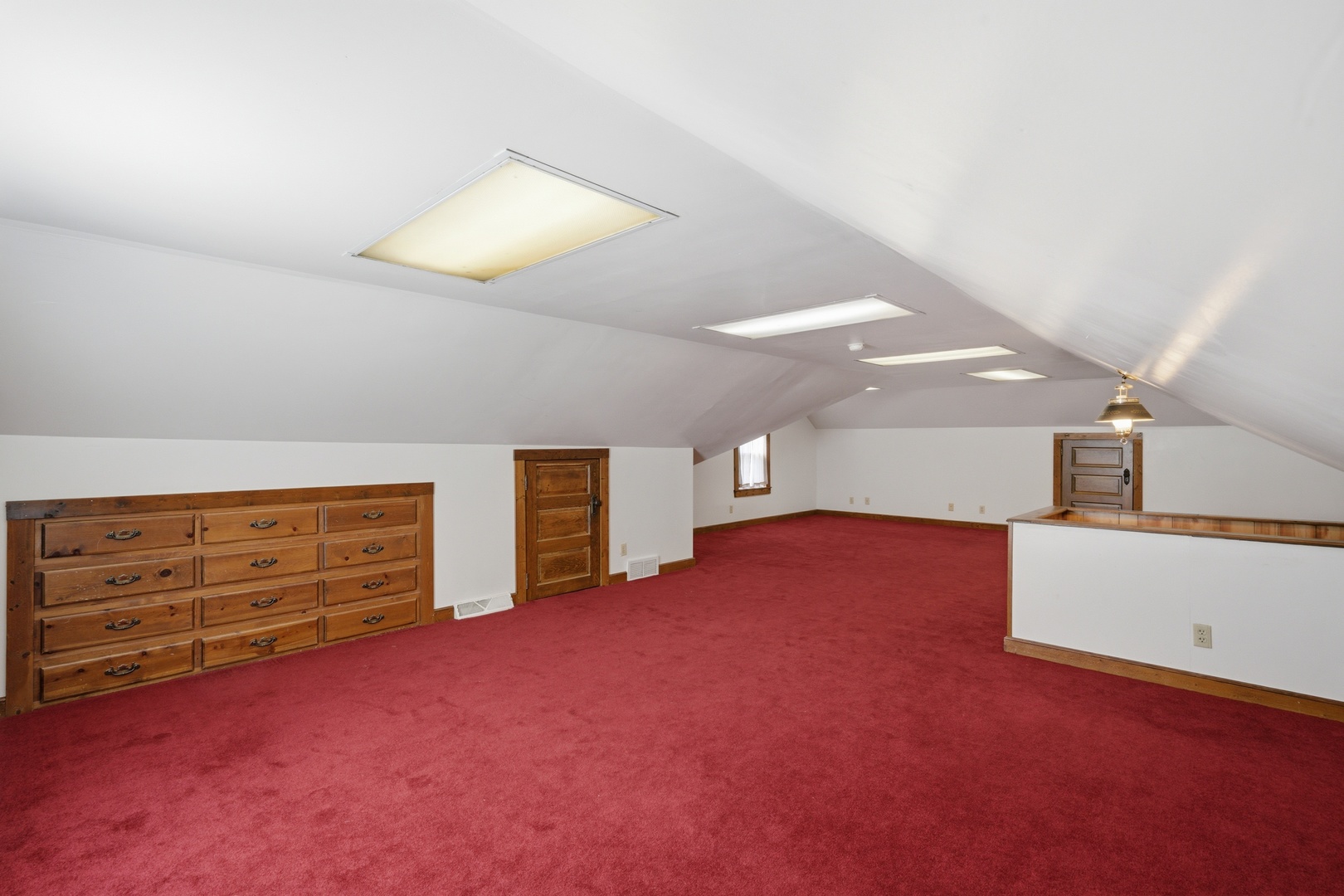 1908 24th Street Moline, IL 61265 - Photo 22 of 32 a view of an empty room with closet and cabinet