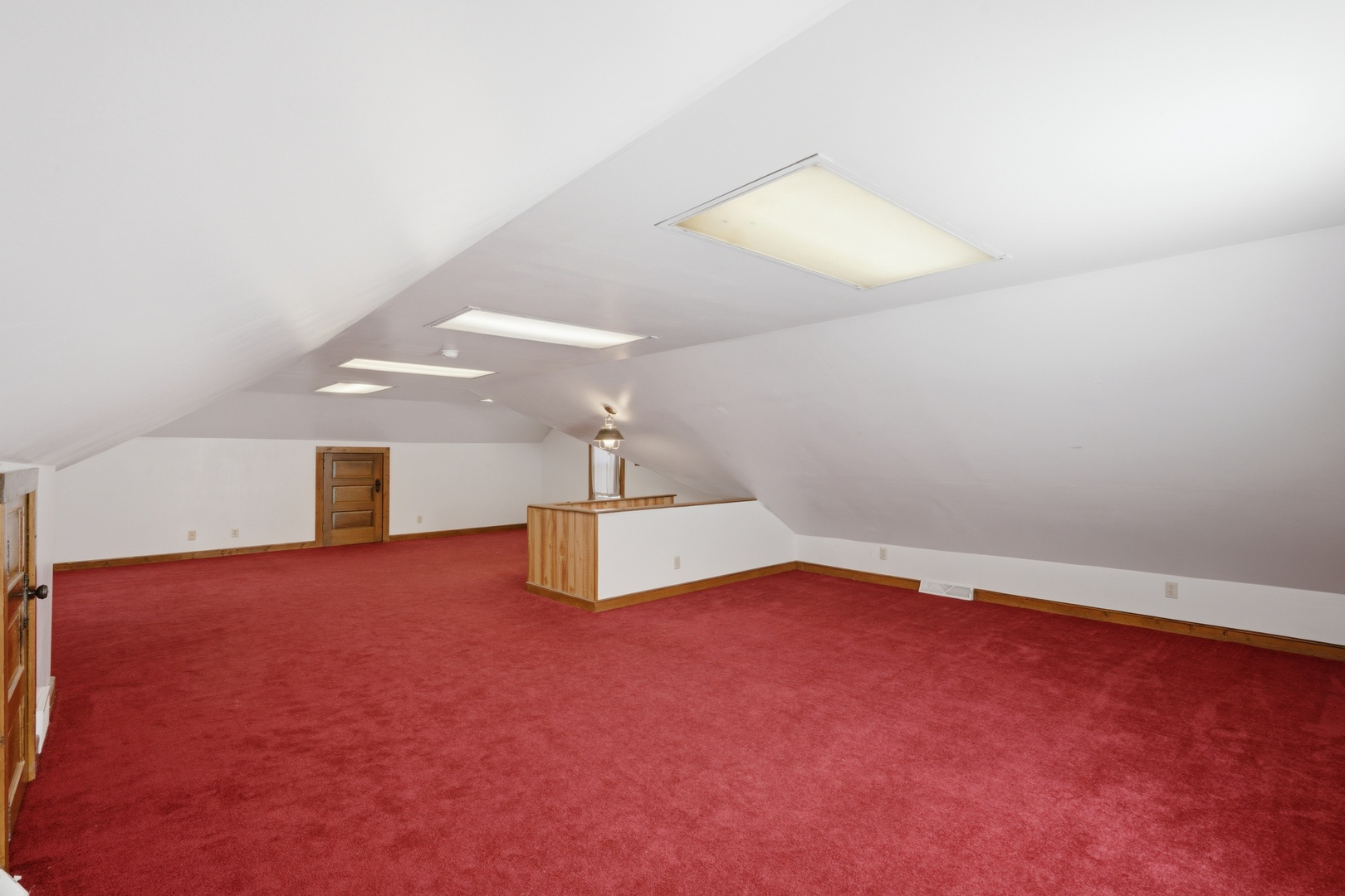1908 24th Street Moline, IL 61265 - Photo 23 of 32 an empty room with wooden floor and windows