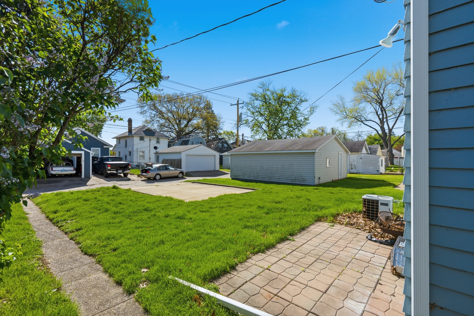 1908 24th Street Moline, IL 61265 - Photo 28 of 32 a view of a backyard with a garden