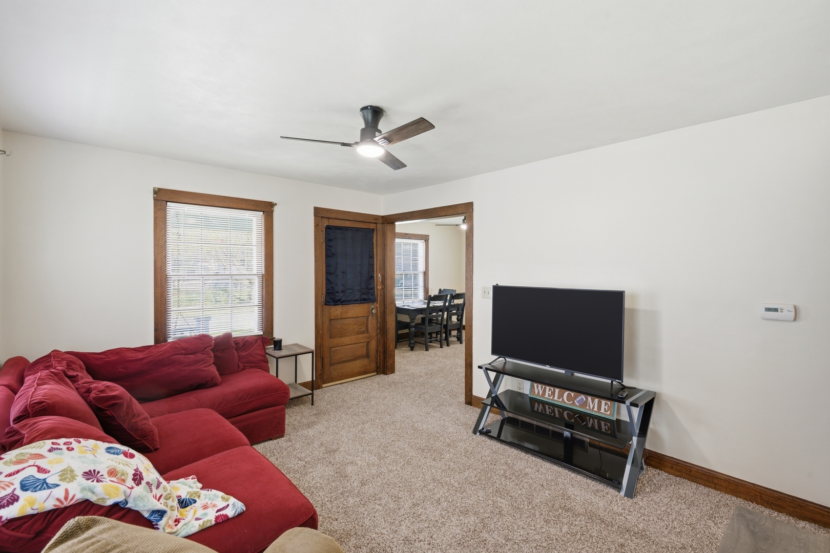 1908 24th Street Moline, IL 61265 - Photo 5 of 32 a living room with furniture and a flat screen tv