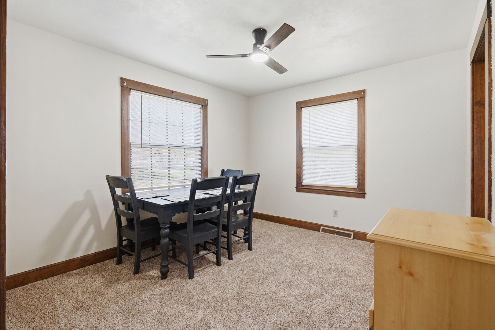 1908 24th Street Moline, IL 61265 - Photo 7 of 32 a view of a dining room with furniture and window