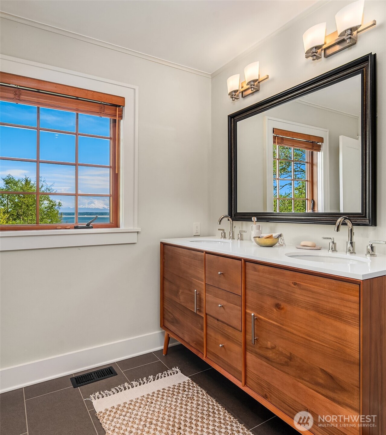 8302 Southwest Dilworth Road Vashon, WA 98070 - Photo 25 of 40 a bathroom with a sink and a mirror
