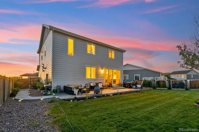a view of house and outdoor space with yard