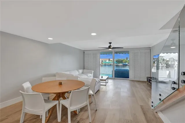a view of a dining room with furniture window and outside view