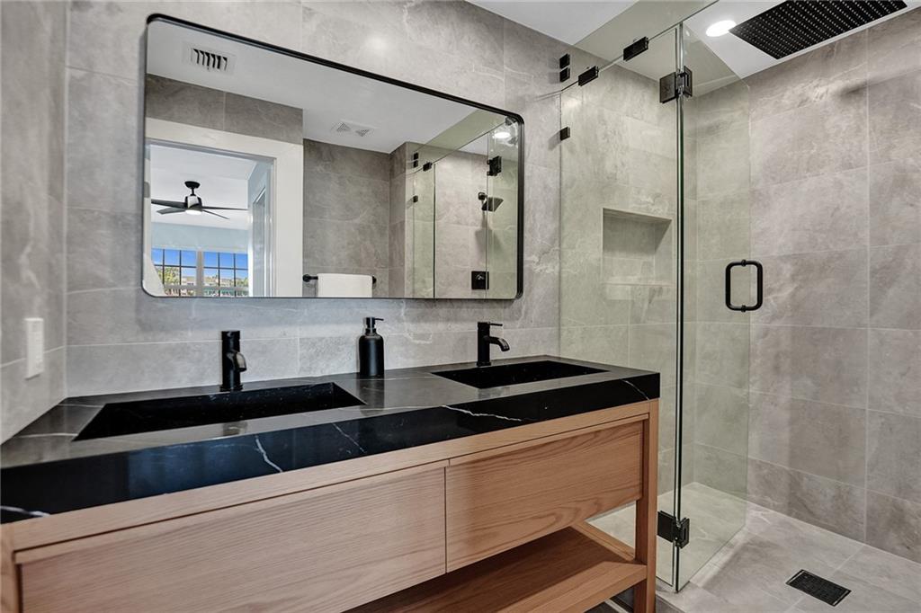 876 Jeffery Street Boca Raton, FL 33487 - Photo 27 of 52 a close view of sink and mirror