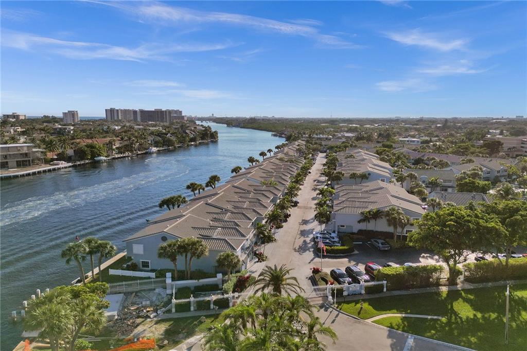 876 Jeffery Street Boca Raton, FL 33487 - Photo 3 of 52 a view of a lake with a city