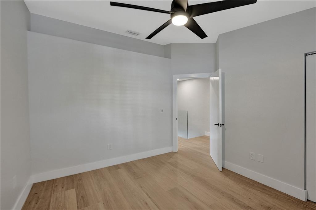 876 Jeffery Street Boca Raton, FL 33487 - Photo 34 of 52 wooden floor in an empty room