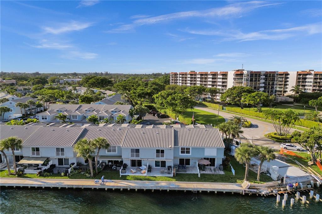 876 Jeffery Street Boca Raton, FL 33487 - Photo 50 of 52 an aerial view of residential houses with outdoor space and swimming pool