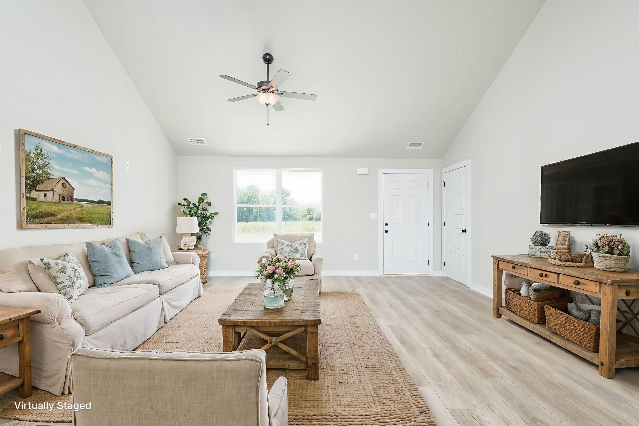 6261 Piney River Road Dickson, TN 37055 - Photo 19 of 32 a living room with furniture and a flat screen tv
