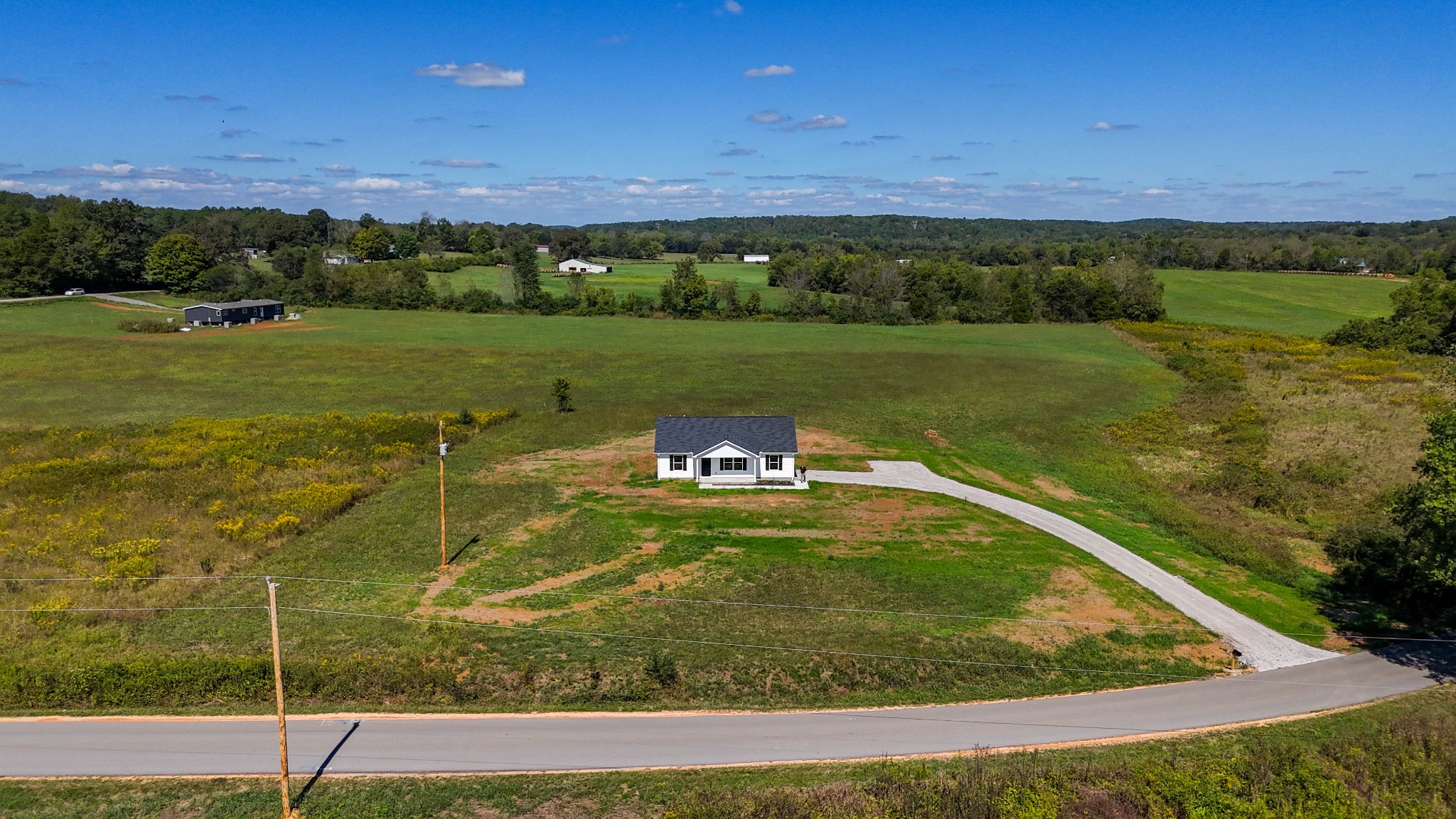 6261 Piney River Road Dickson, TN 37055 - Photo 5 of 32 a view of a swimming pool with a yard