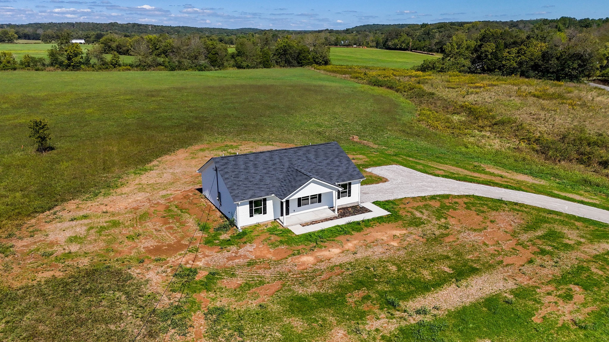 6261 Piney River Road Dickson, TN 37055 - Photo 8 of 32 a aerial view of a house with a yard lake view and mountain view