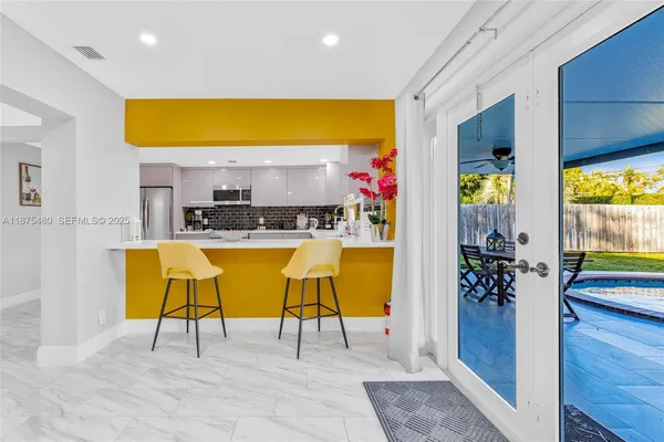 a view of an outdoor dining room with bathroom