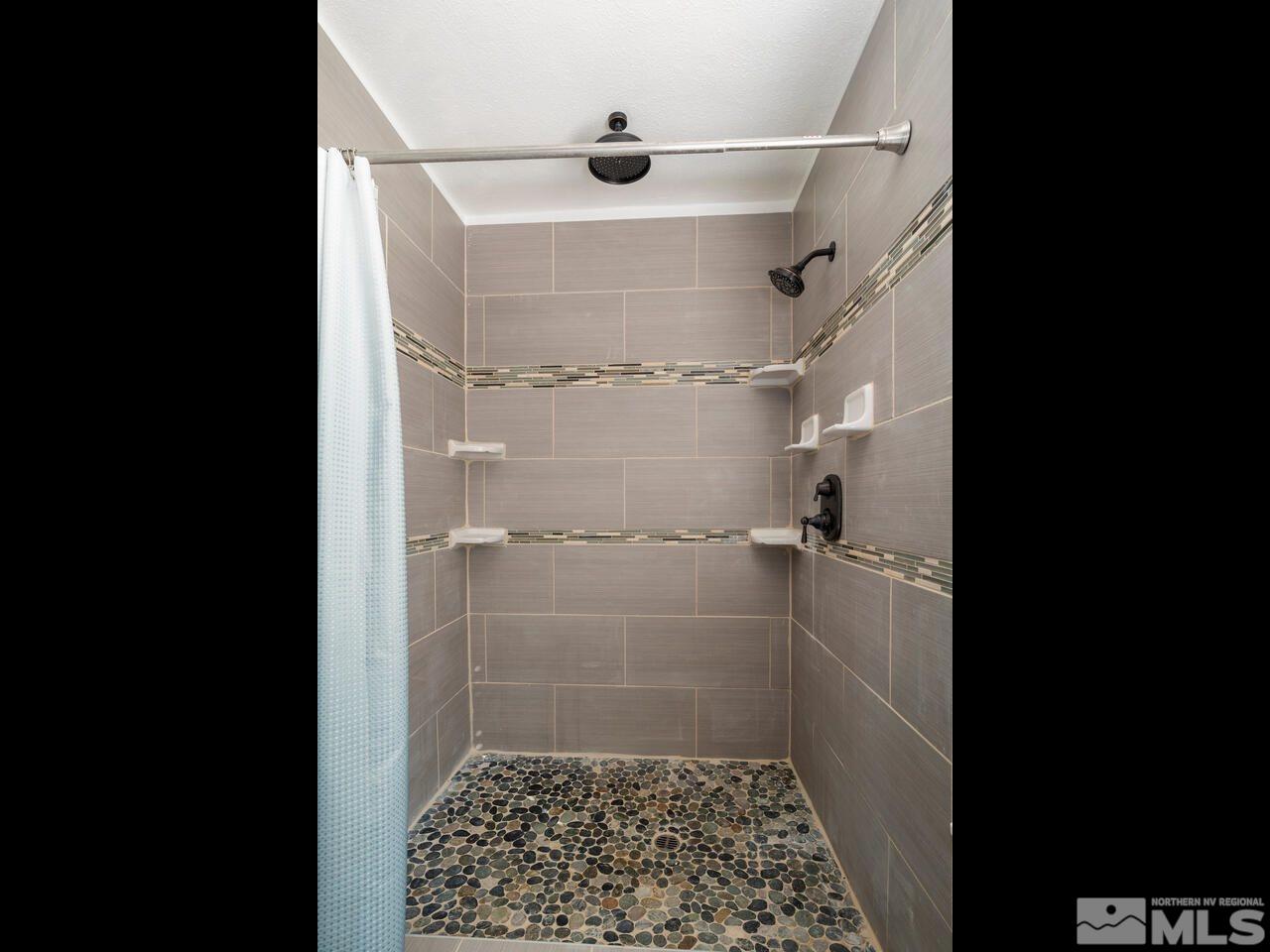 8515 Gate Street Reno, NV 89506 - Photo 12 of 19 a bathroom with a shower