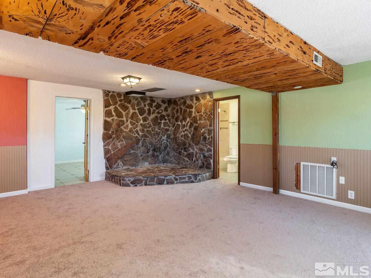 8515 Gate Street Reno, NV 89506 - Photo 13 of 19 a view of a room with wooden walls