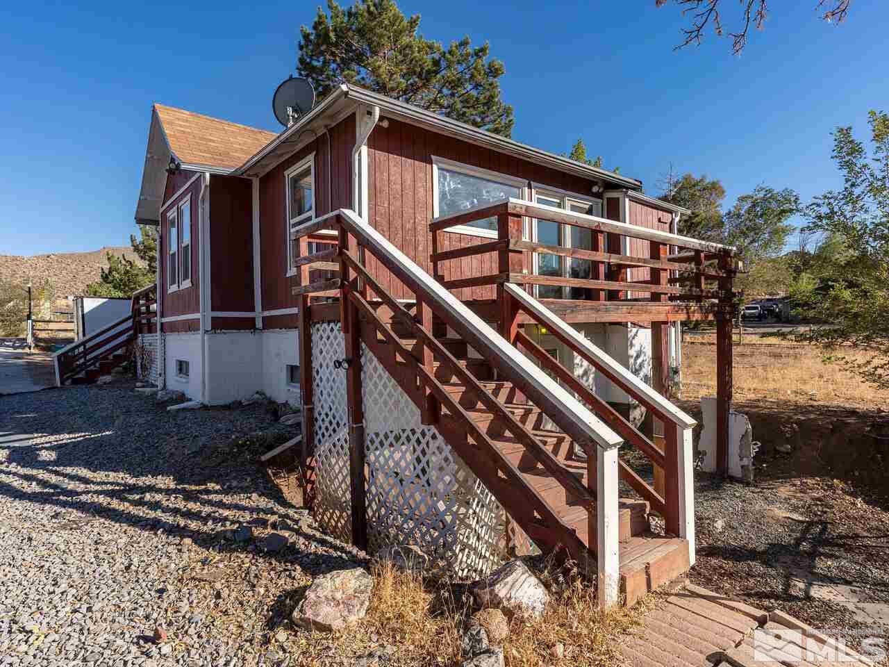 8515 Gate Street Reno, NV 89506 - Photo 18 of 19 a front view of a house with wooden stairs