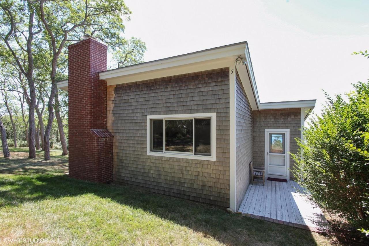 5 Slade Hill Road Truro, MA 02666 - Photo 14 of 15 a front view of a house with a yard