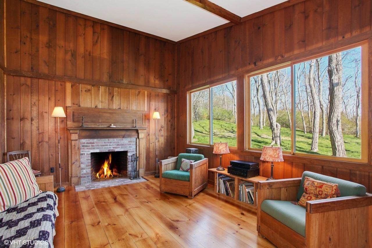 5 Slade Hill Road Truro, MA 02666 - Photo 4 of 15 a living room with furniture and a fireplace