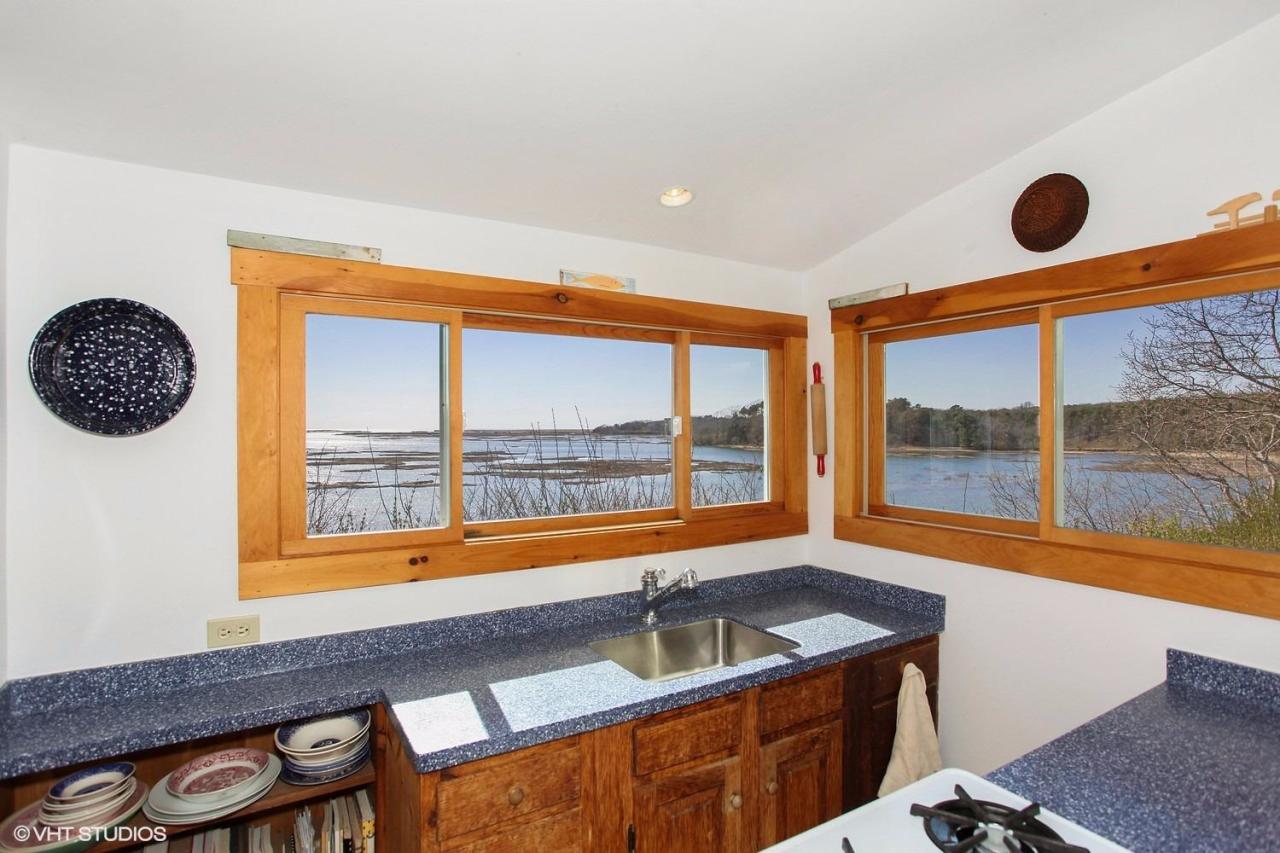 5 Slade Hill Road Truro, MA 02666 - Photo 7 of 15 a kitchen with a sink and a large window
