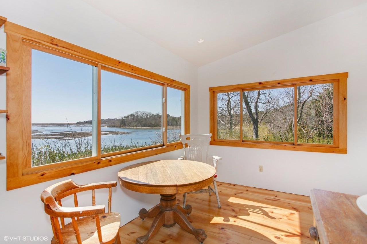 5 Slade Hill Road Truro, MA 02666 - Photo 9 of 15 a balcony with table and chairs