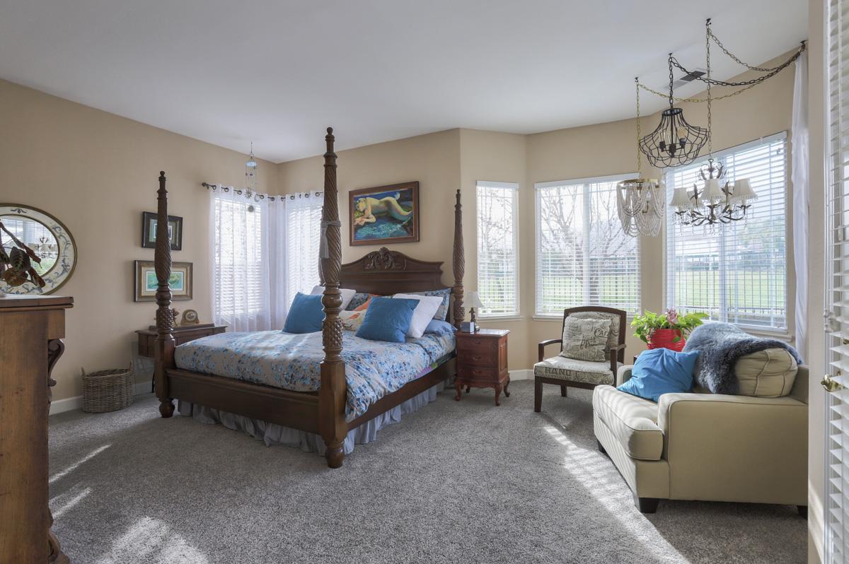 1949 St Andrews Circle, Unit CL Gilroy, CA 95020 - Photo 12 of 21 a living room with furniture and a large window