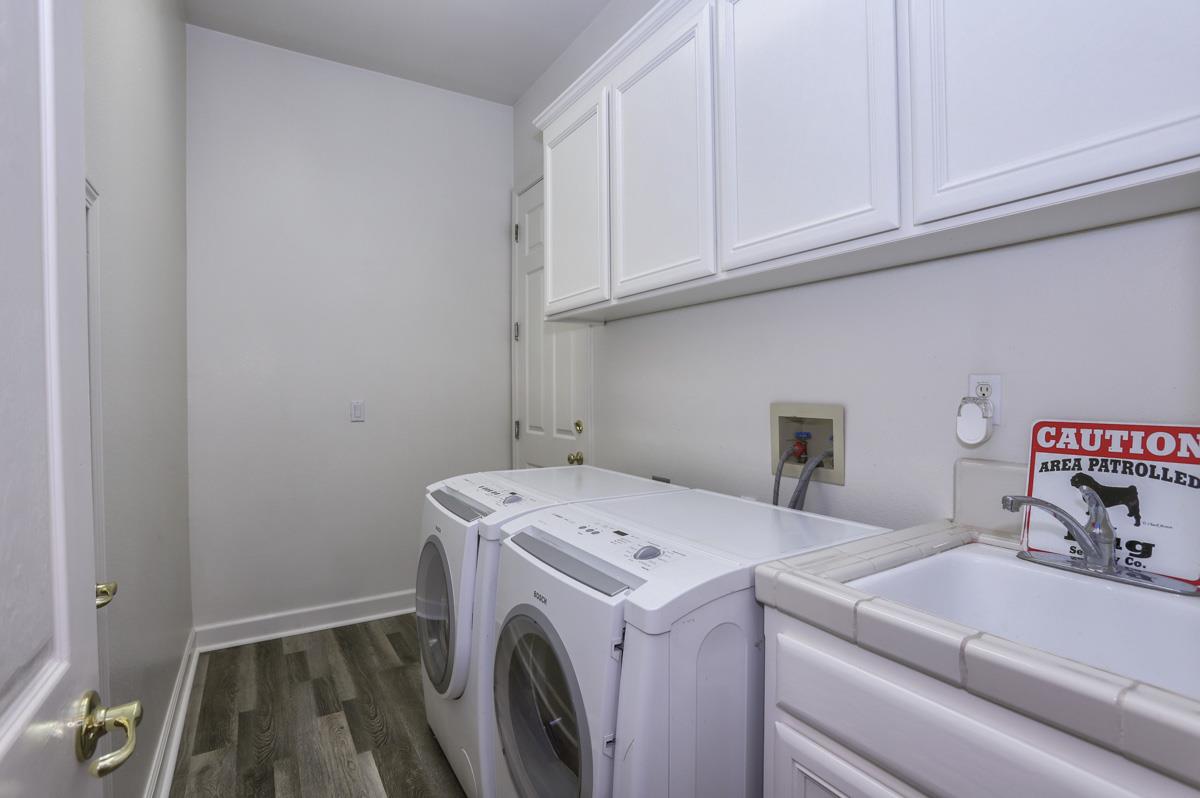 1949 St Andrews Circle, Unit CL Gilroy, CA 95020 - Photo 17 of 21 a utility room with dryer and washer