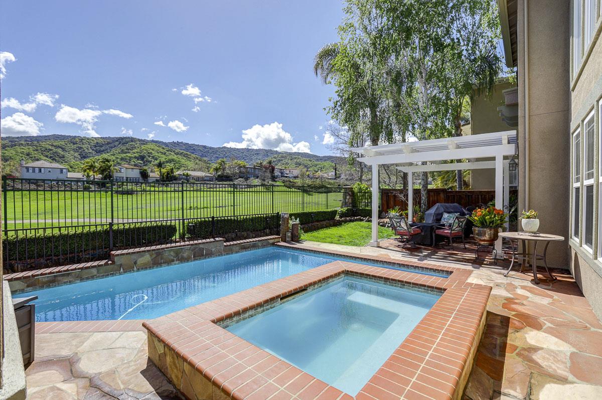 1949 St Andrews Circle, Unit CL Gilroy, CA 95020 - Photo 6 of 21 a view of a house with swimming pool and sitting area