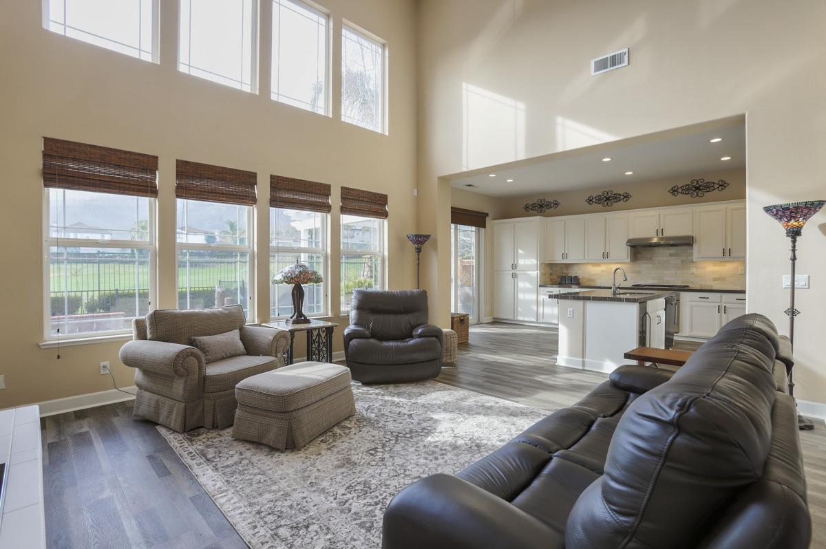 1949 St Andrews Circle, Unit CL Gilroy, CA 95020 - Photo 9 of 21 a living room with furniture and a large window