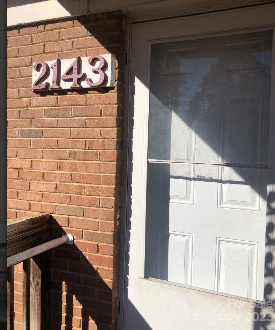 1702 Newland Road Charlotte, NC 28216 - Photo 19 of 34 a view of a door and an umbrella